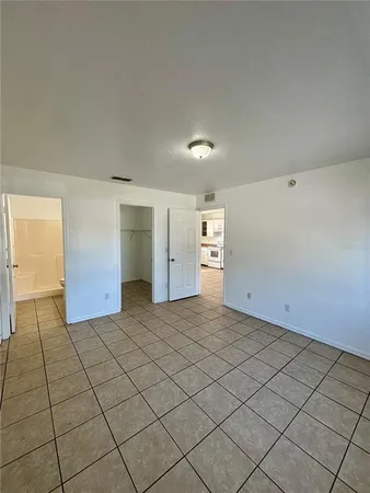 a bathroom with a double vanity sink mirror and toilet