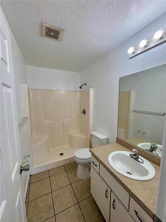 6 Spring Trail Ocala, FL 34472 - Photo 8 of 16 a bathroom with a double vanity sink mirror and toilet