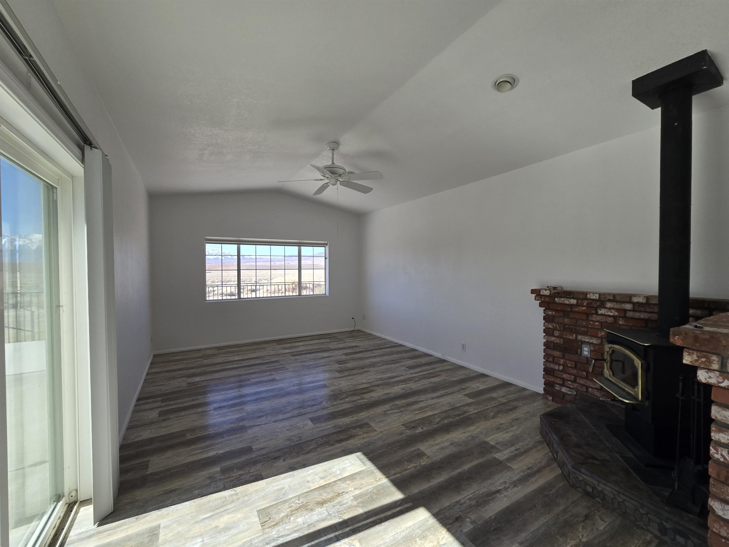 75 Sequoia Street Chalfant, CA 93514 - Photo 13 of 21 a view of a livingroom with wooden floor