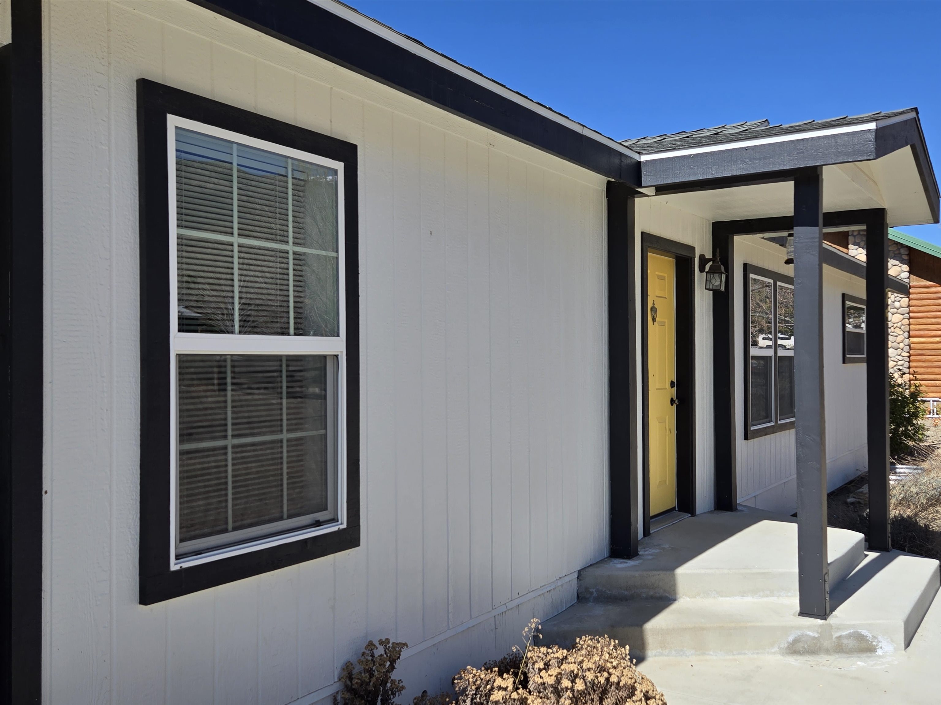 75 Sequoia Street Chalfant, CA 93514 - Photo 2 of 21 a view of livingroom with windows