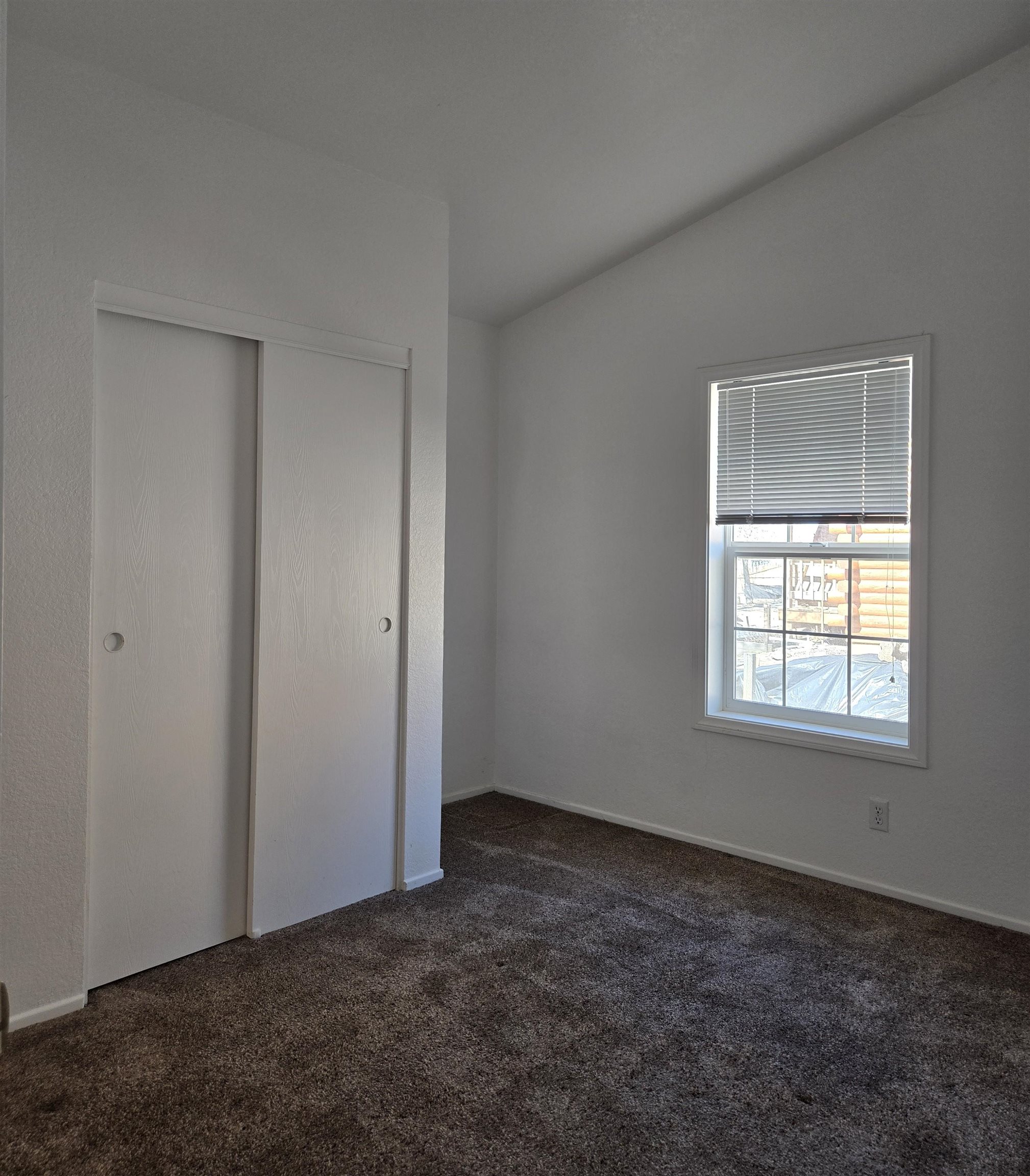 75 Sequoia Street Chalfant, CA 93514 - Photo 9 of 21 an empty room with a window