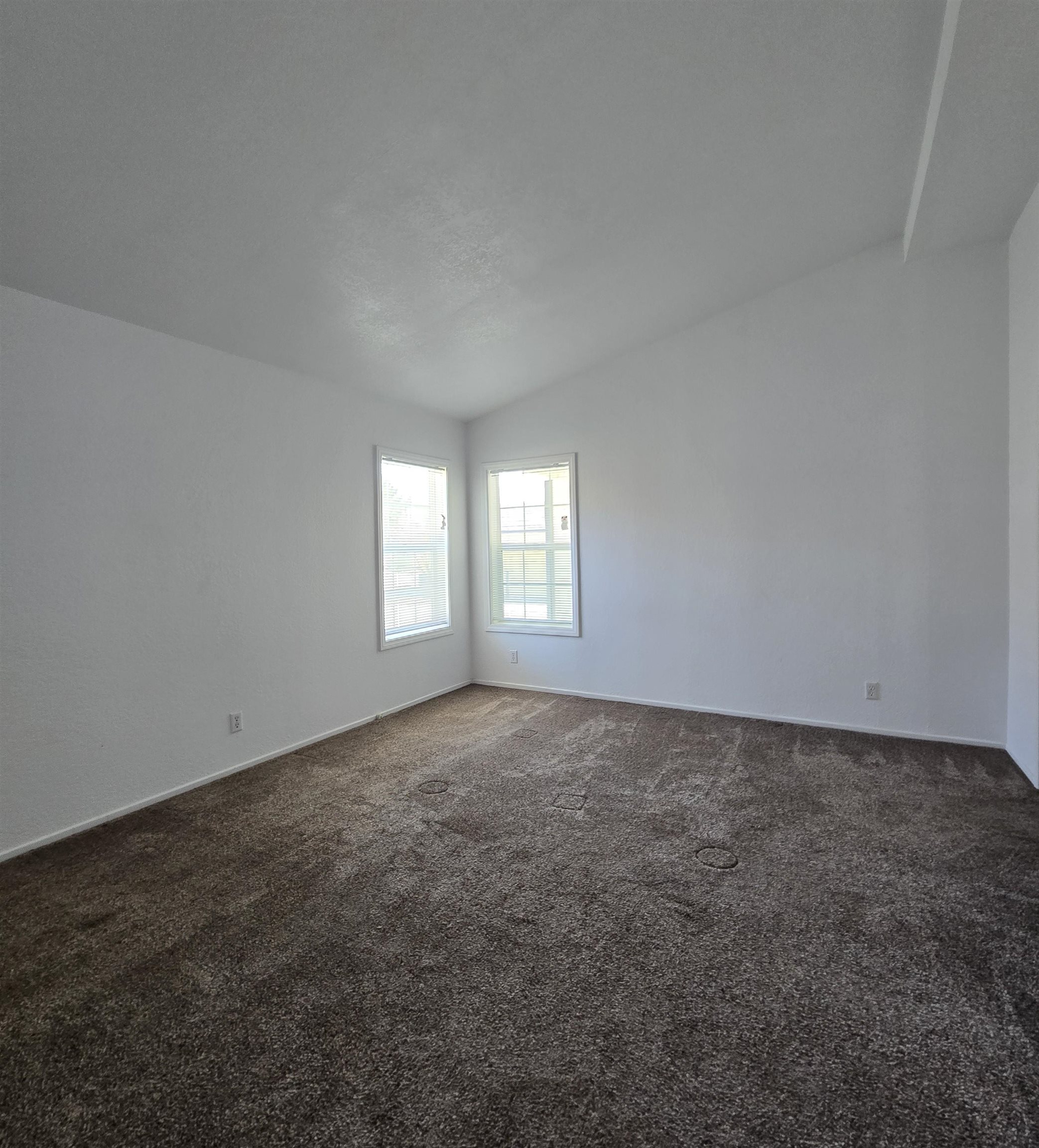 75 Sequoia Street Chalfant, CA 93514 - Photo 10 of 21 an empty room with windows