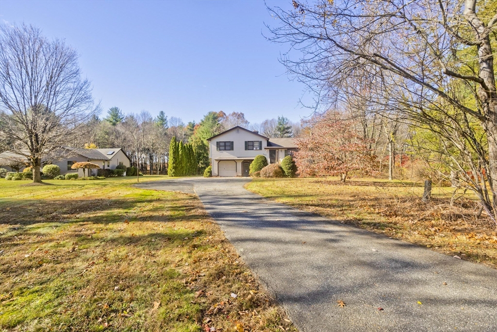 425 Miller Street Ludlow, MA 01056 - Photo 1 of 40 a view of a swimming pool with an outdoor space and seating area