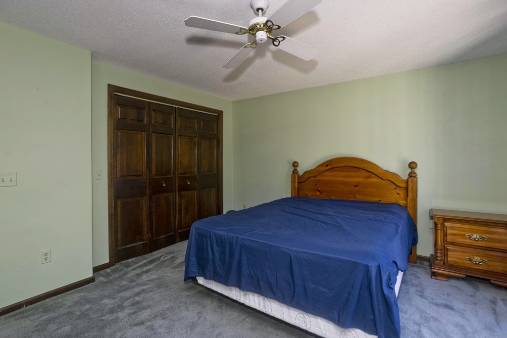 425 Miller Street Ludlow, MA 01056 - Photo 18 of 40 a bedroom with a bed and a closet