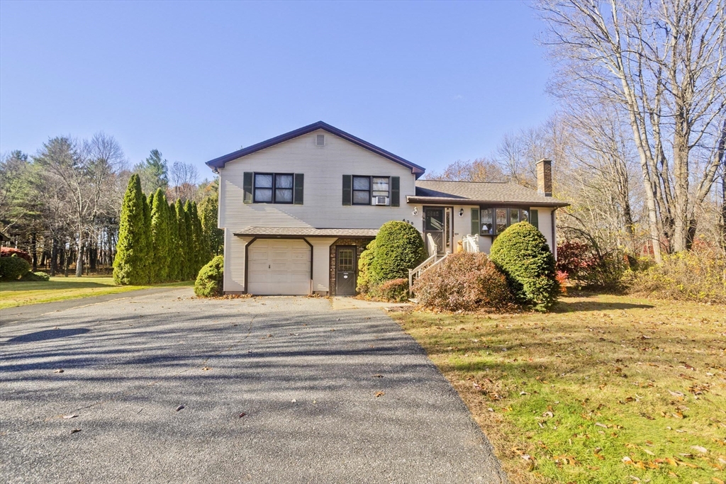 425 Miller Street Ludlow, MA 01056 - Photo 2 of 40 a view of house with yard and swimming pool