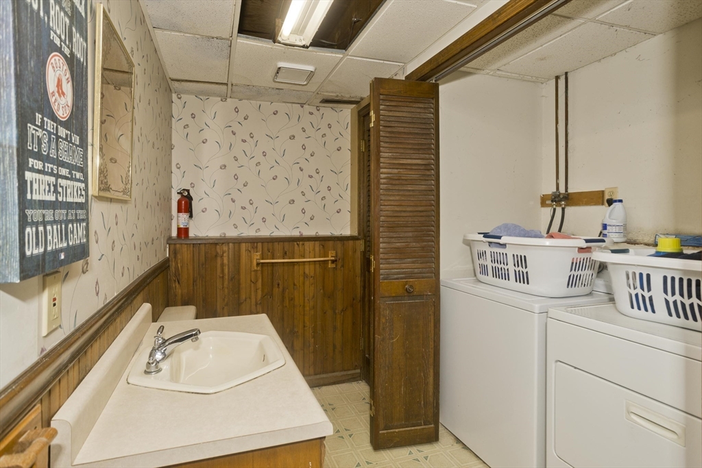 425 Miller Street Ludlow, MA 01056 - Photo 30 of 40 a bathroom with a sink a toilet and shower