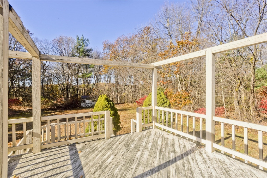 425 Miller Street Ludlow, MA 01056 - Photo 37 of 40 a view of a balcony with wooden floor and outdoor space