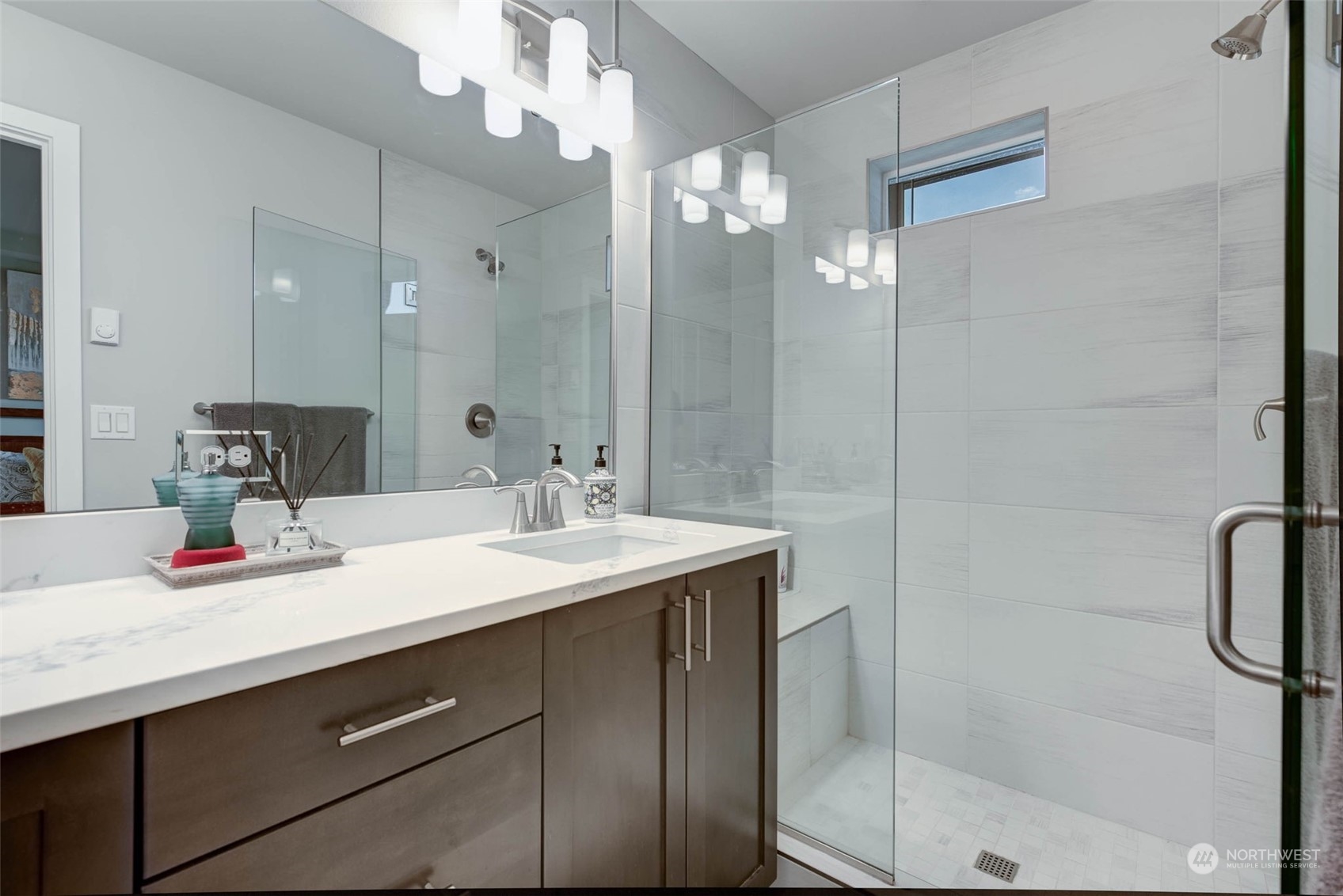 524 Pl Se 238th Bothell Wa 98021, Unit D Bothell, WA 98021 - Photo 23 of 37 a bathroom with a sink shower and a mirror