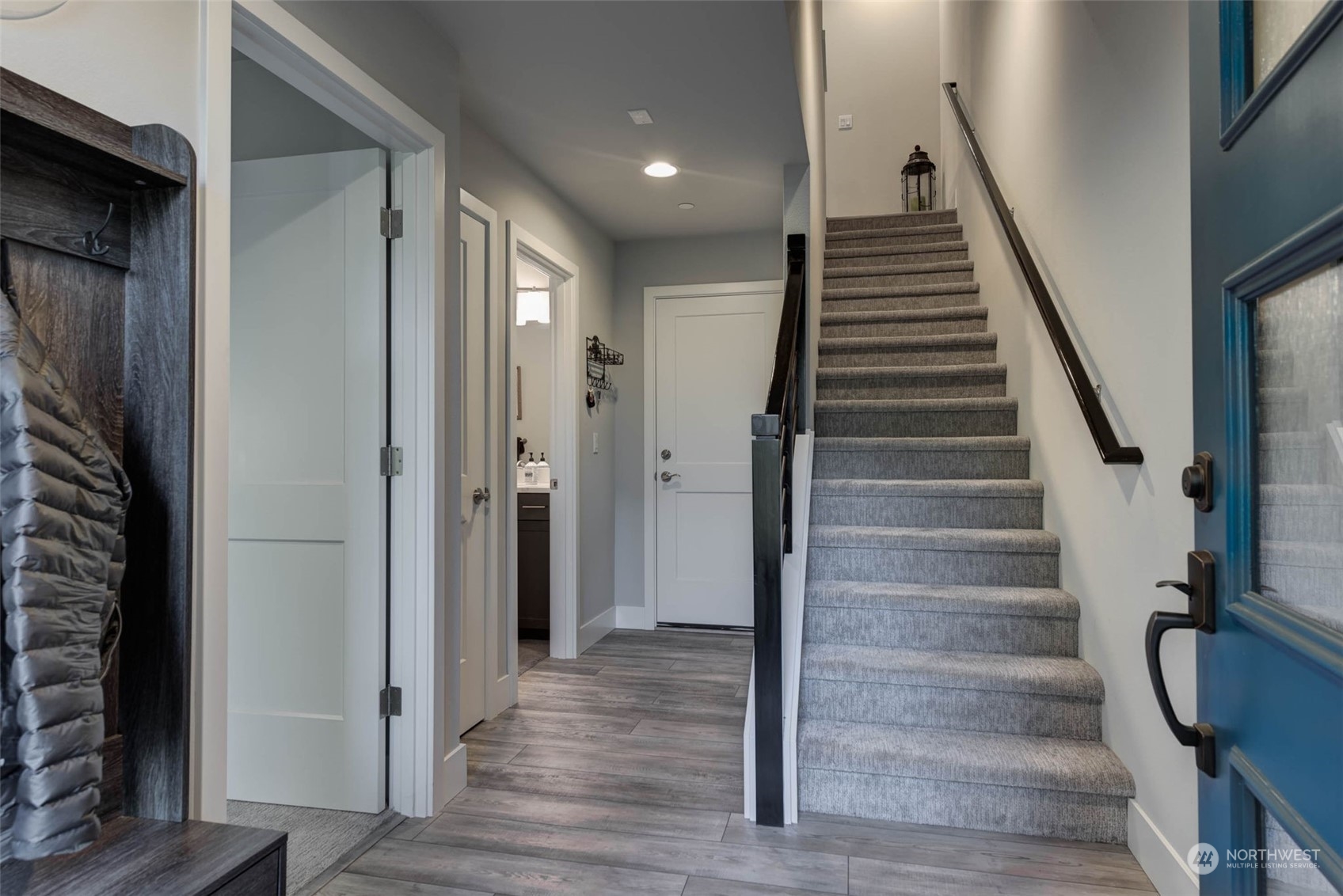 524 Pl Se 238th Bothell Wa 98021, Unit D Bothell, WA 98021 - Photo 4 of 37 a view of an entryway with wooden floor and staircase