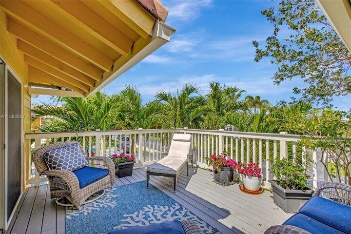 237 Seabreeze Circle Jupiter, FL 33477 - Photo 1 of 20 a view of a balcony with furniture