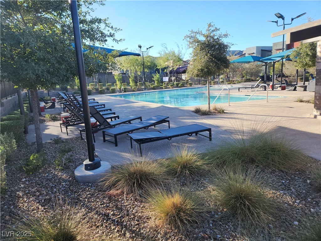 3197 Bertonico Street Henderson, NV 89044 - Photo 19 of 30 Community pool with a patio area
