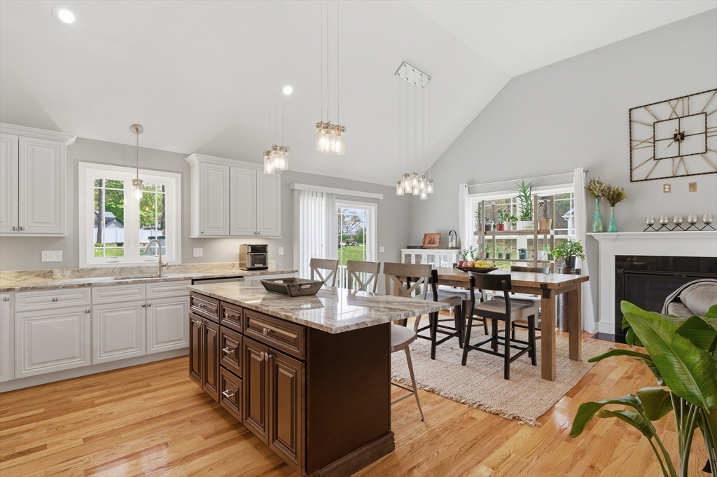 19 Progress Avenue Dudley, MA 01571 - Photo 2 of 42 a kitchen with granite countertop a sink appliances and cabinets