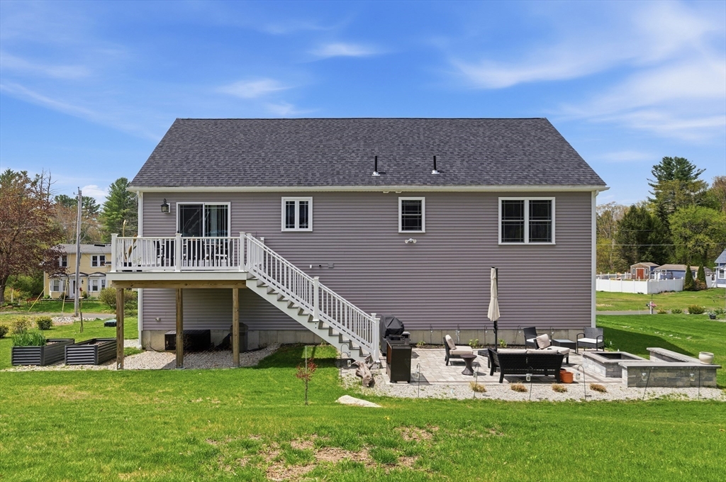 19 Progress Avenue Dudley, MA 01571 - Photo 29 of 42 a view of a house with a yard porch and sitting area
