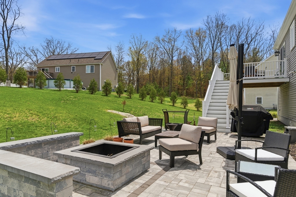 19 Progress Avenue Dudley, MA 01571 - Photo 31 of 42 a view of a patio with a yard
