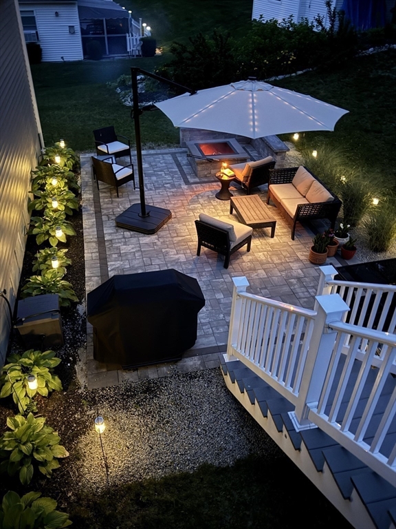 19 Progress Avenue Dudley, MA 01571 - Photo 41 of 42 a view of a chairs and table in backyard