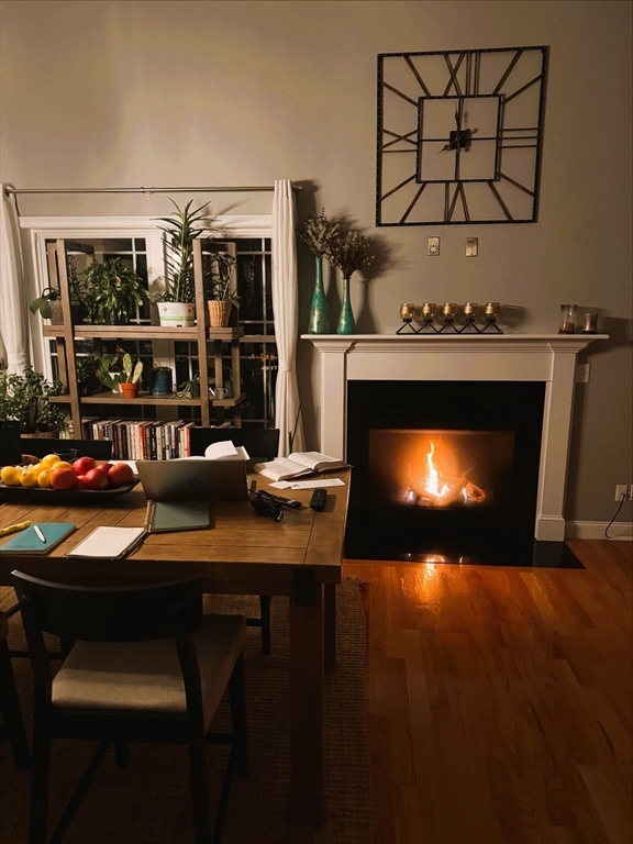 19 Progress Avenue Dudley, MA 01571 - Photo 42 of 42 a living room with furniture a fireplace and wall paintings