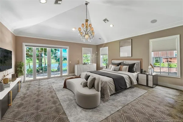 a bedroom with a bed lamps and window
