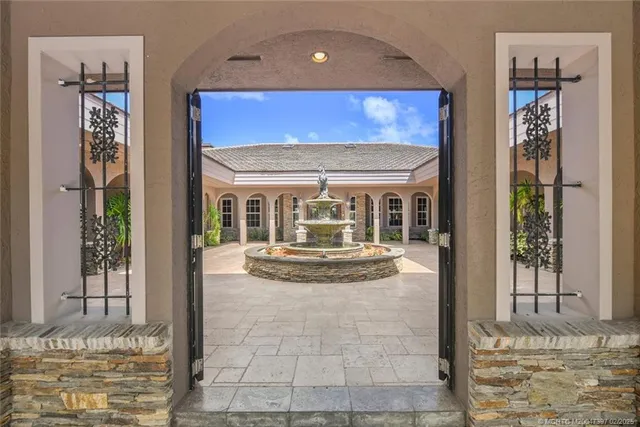 a living room with fireplace furniture and a flat screen tv