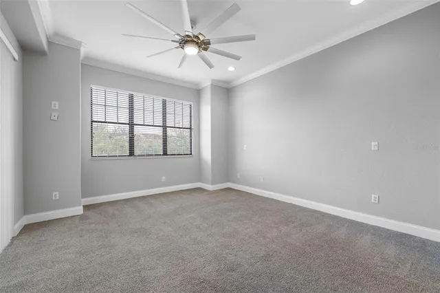 a view of empty room with fan