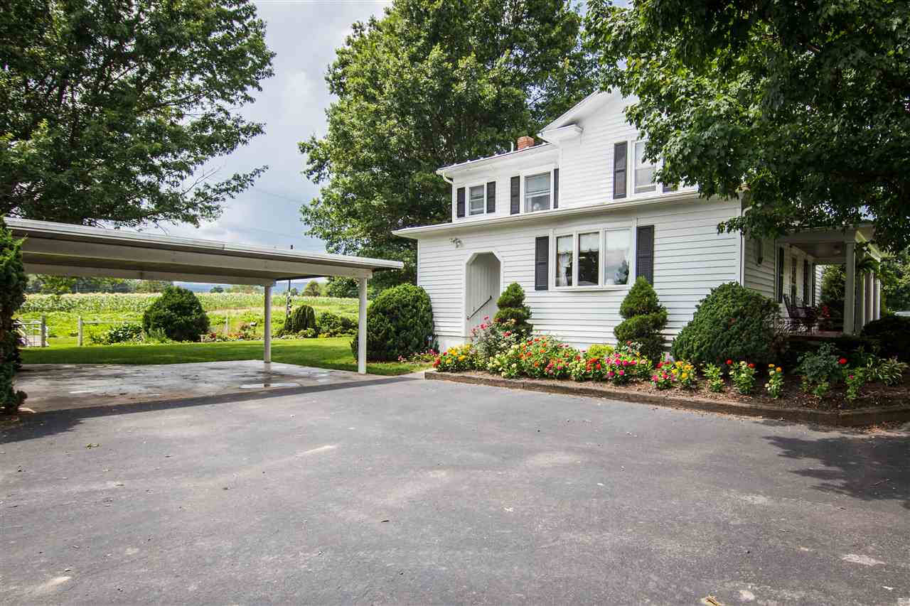 5565 Briery Branch Road Dayton, VA 22821 - Photo 19 of 26 front view of a house with a garden