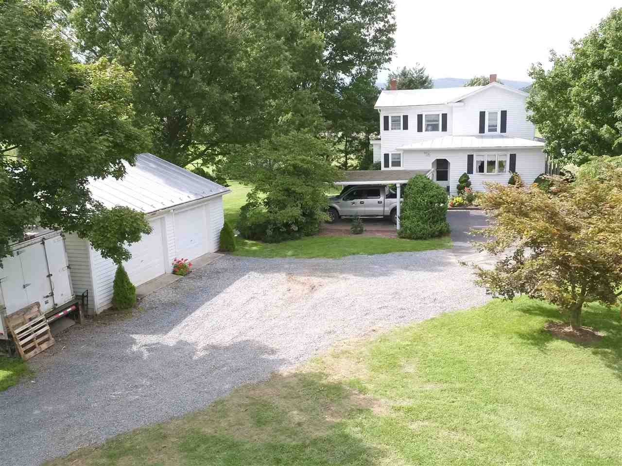 5565 Briery Branch Road Dayton, VA 22821 - Photo 22 of 26 a view of a house with a yard and sitting area