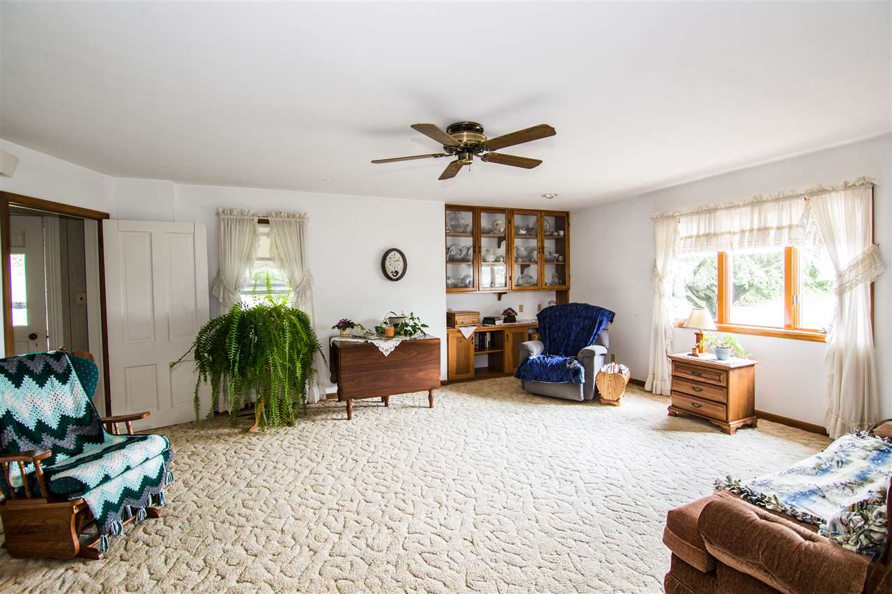 5565 Briery Branch Road Dayton, VA 22821 - Photo 7 of 26 a living room with furniture and a large window