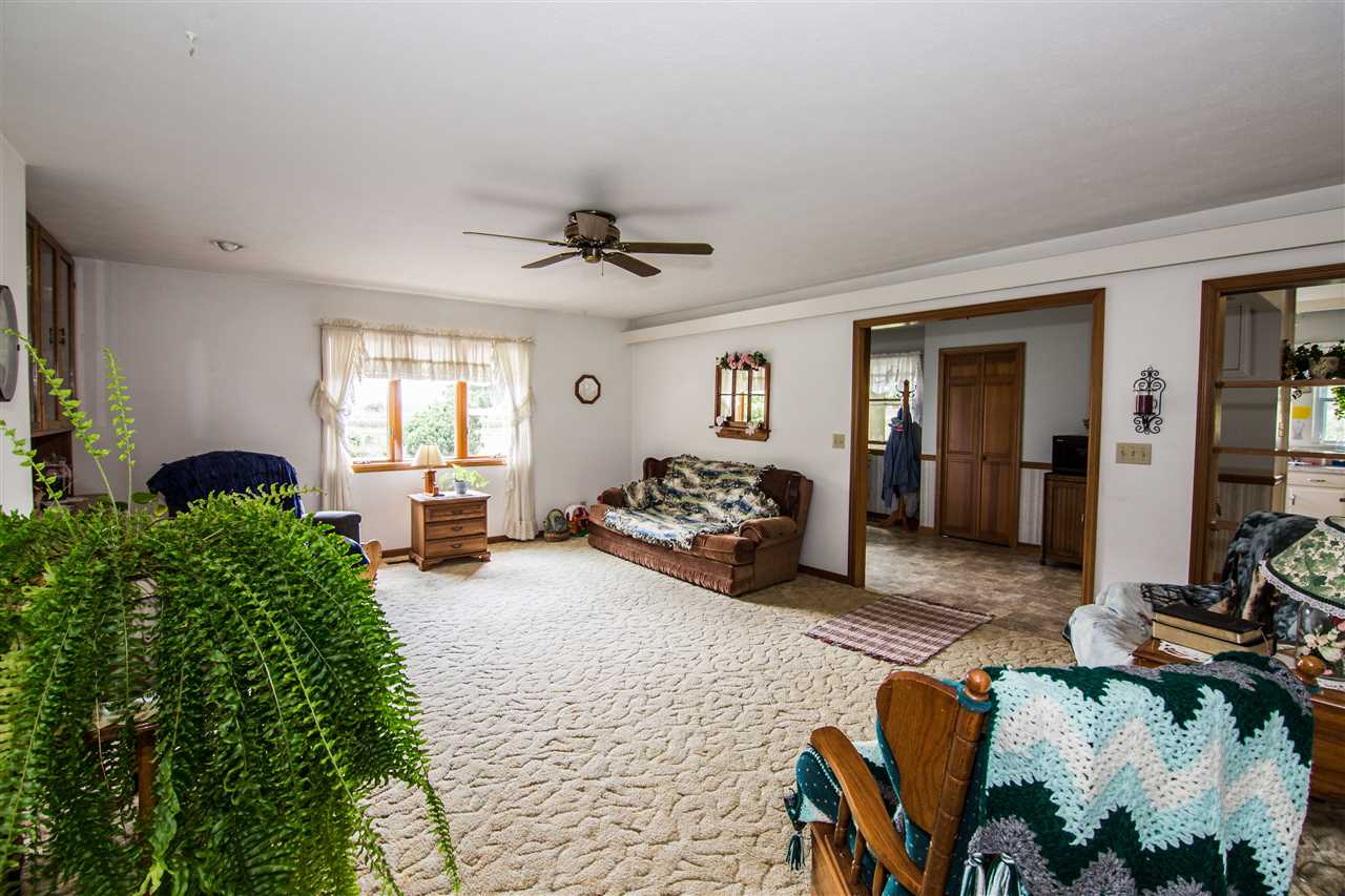 5565 Briery Branch Road Dayton, VA 22821 - Photo 8 of 26 a living room with furniture and a flat screen tv