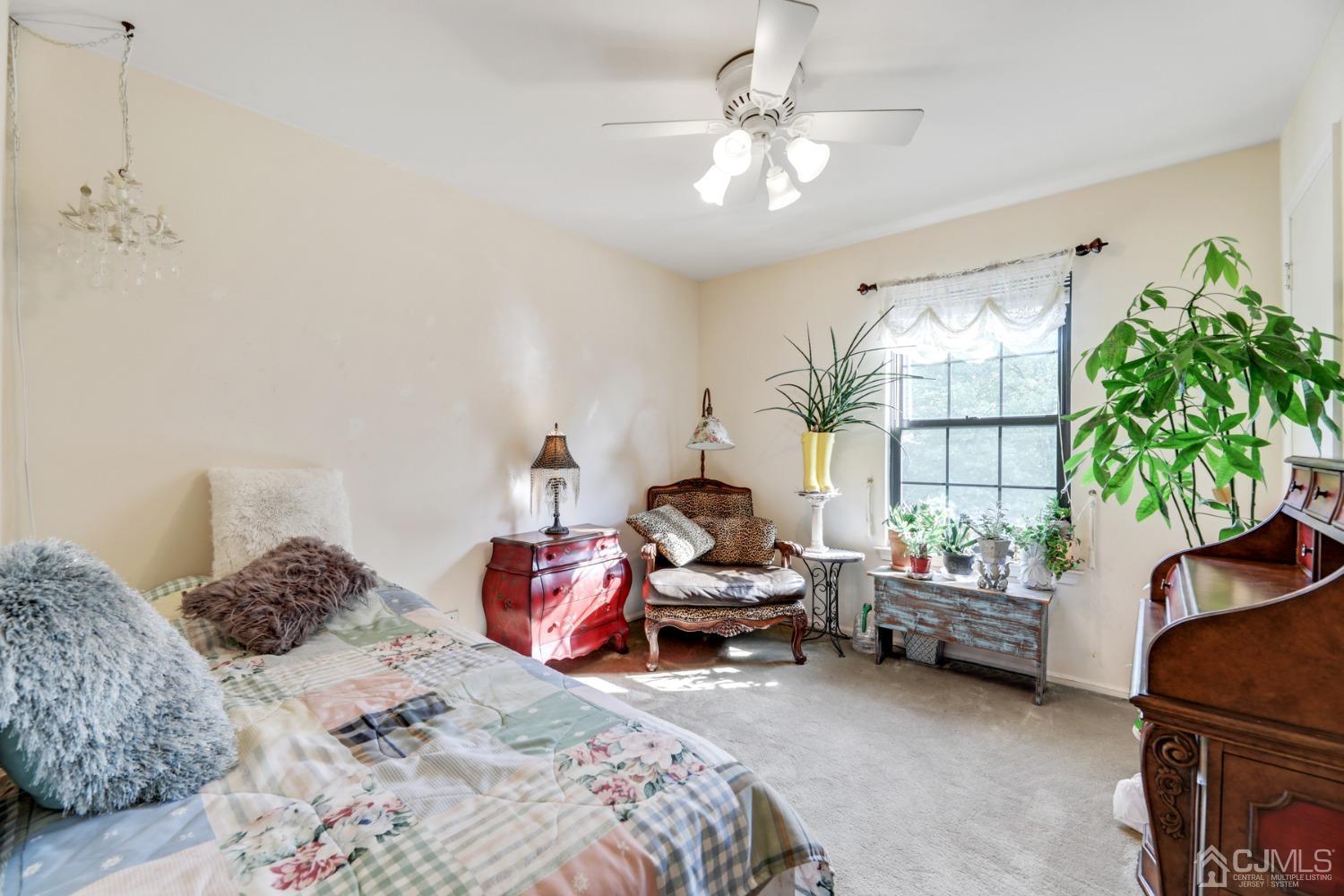 81 Pheasant Run Edison, NJ 08820 - Photo 15 of 24 a bedroom with bed and a window
