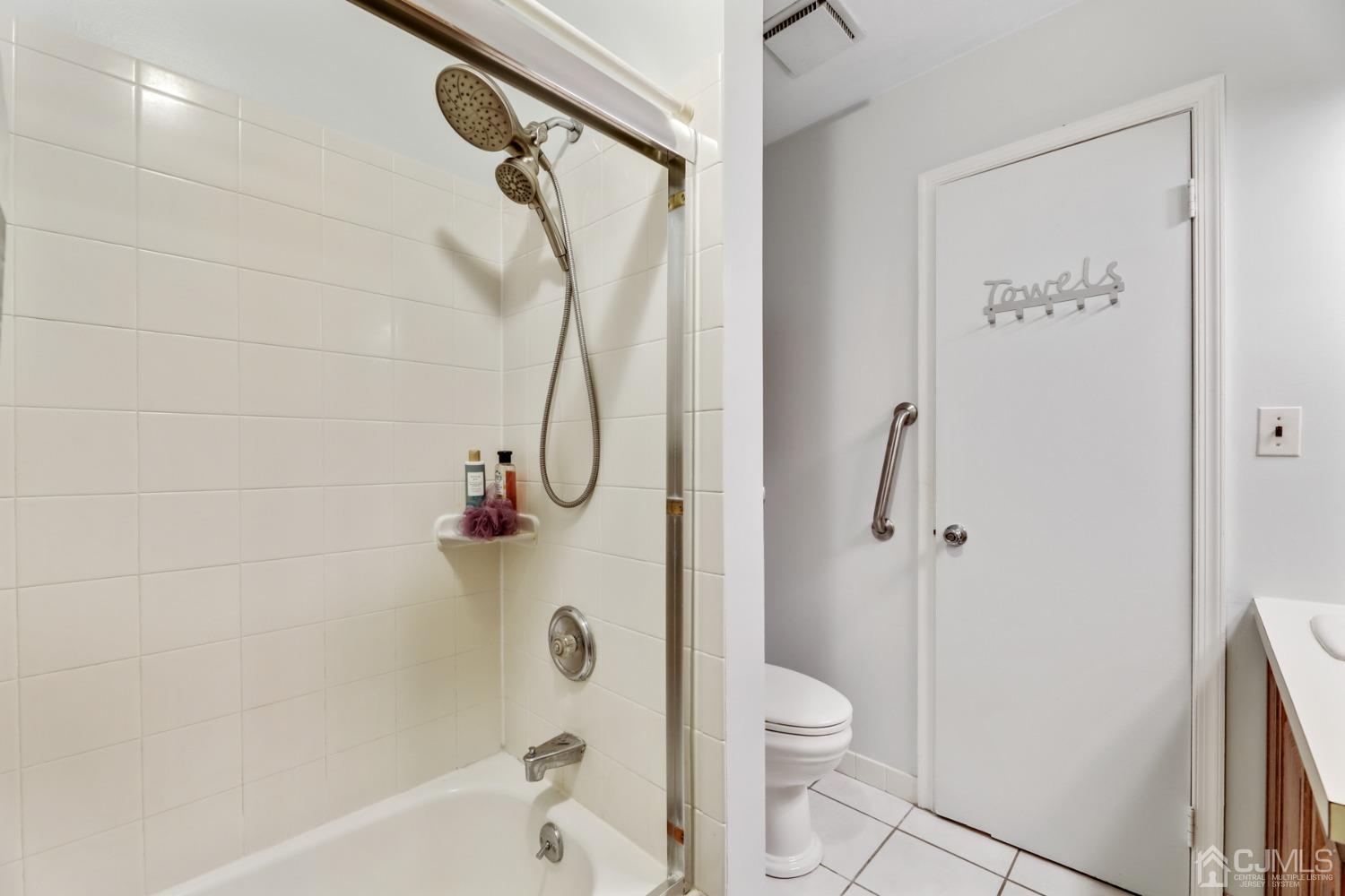 81 Pheasant Run Edison, NJ 08820 - Photo 17 of 24 a bathroom with a shower a toilet and a shower