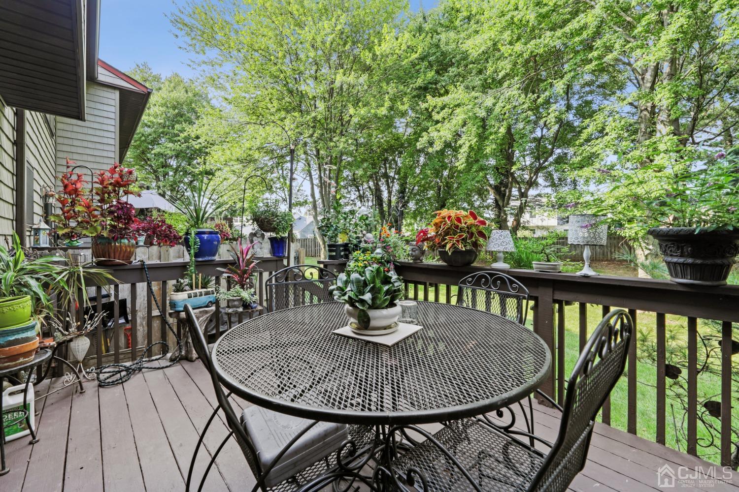 81 Pheasant Run Edison, NJ 08820 - Photo 20 of 24 a view of a balcony dining area with swimming pool