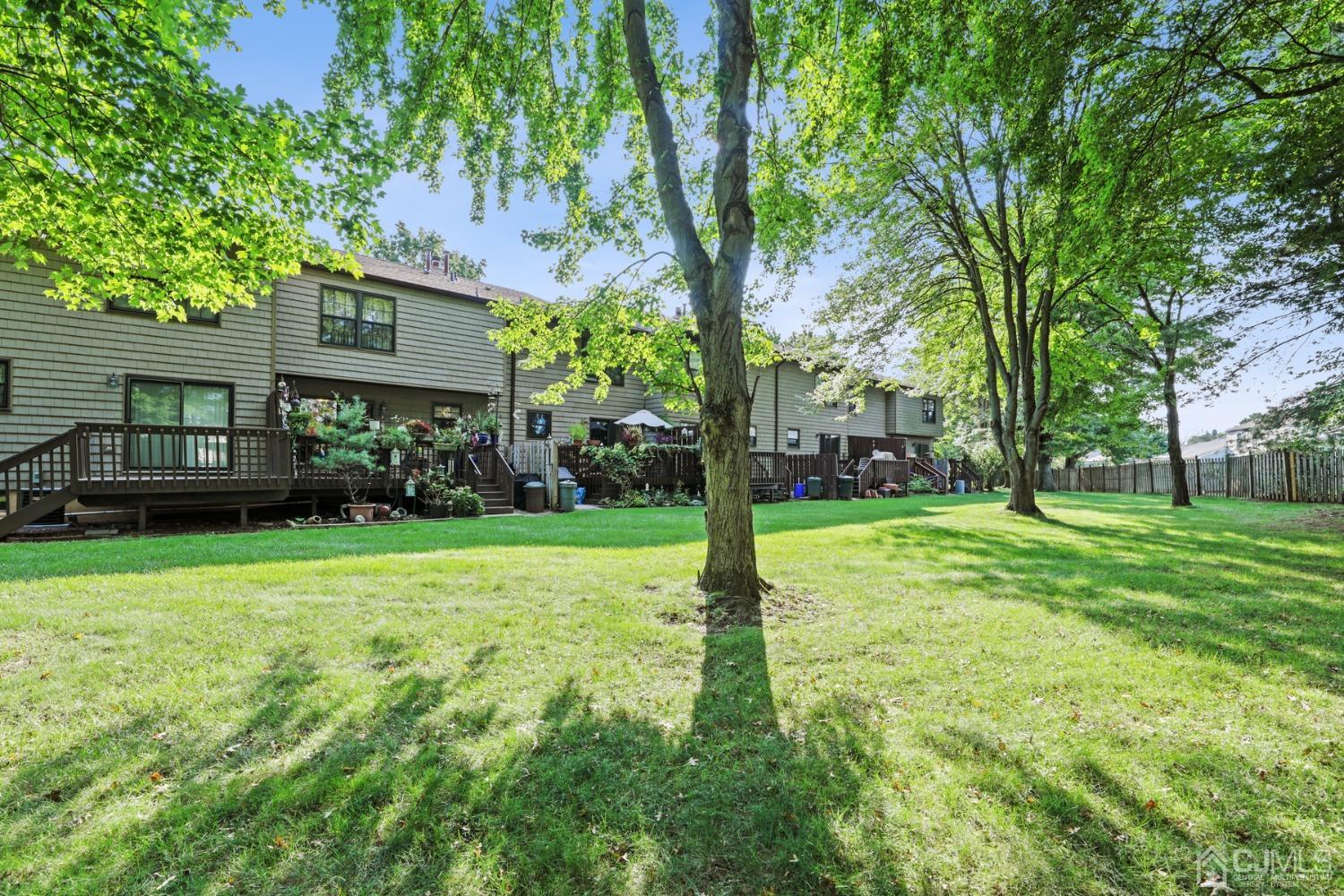 81 Pheasant Run Edison, NJ 08820 - Photo 21 of 24 a view of a house with a backyard