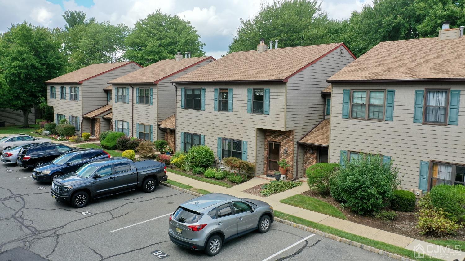81 Pheasant Run Edison, NJ 08820 - Photo 22 of 24 a car parked in front of a house