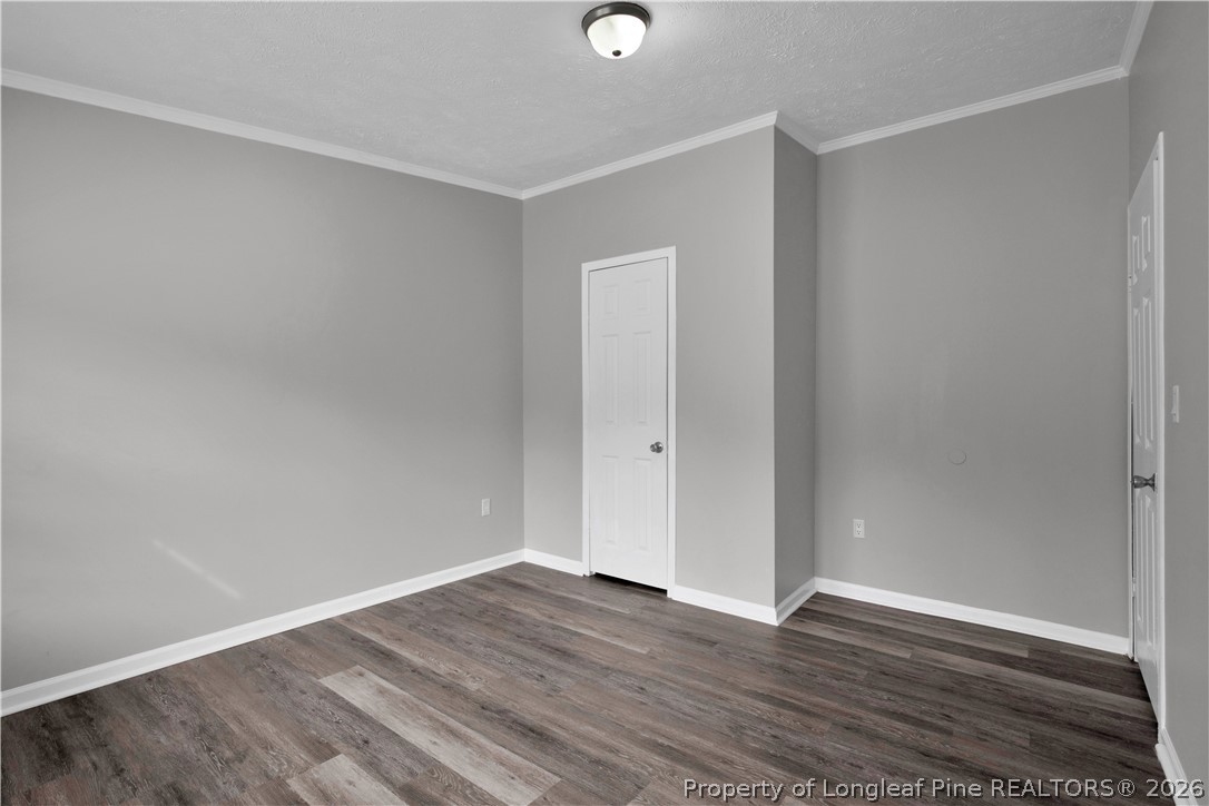 143 South Cherry St Extension Pinebluff, NC 28373 - Photo 14 of 25 a view of an empty room with wooden floor