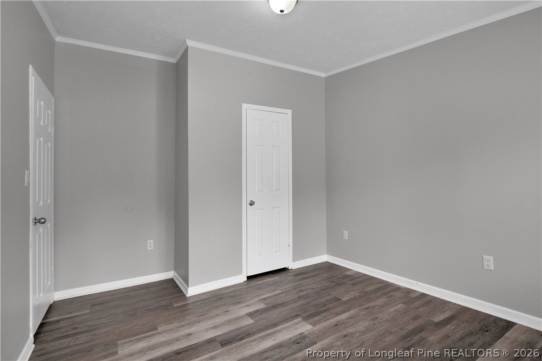 143 South Cherry St Extension Pinebluff, NC 28373 - Photo 16 of 25 a view of an empty room with wooden floor