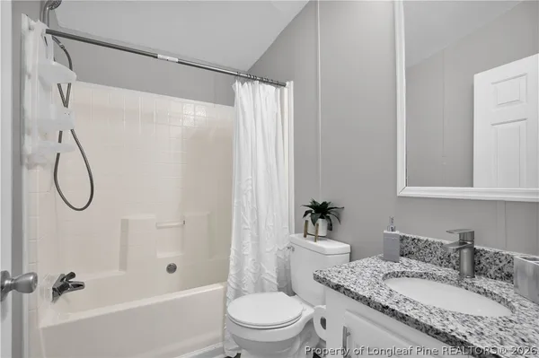 a view of a room that has a window in it