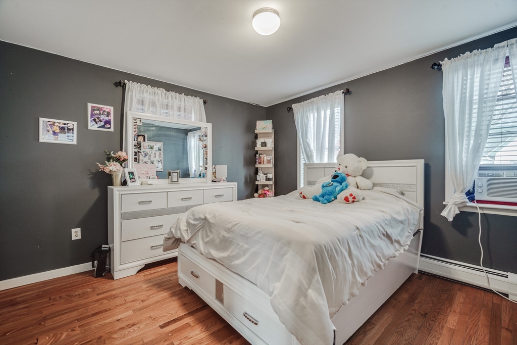 18 Chester Street Springfield, MA 01105 - Photo 21 of 41 a bedroom with a bed and window