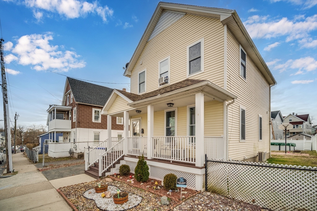 18 Chester Street Springfield, MA 01105 - Photo 5 of 41 a front view of a house with a balcony