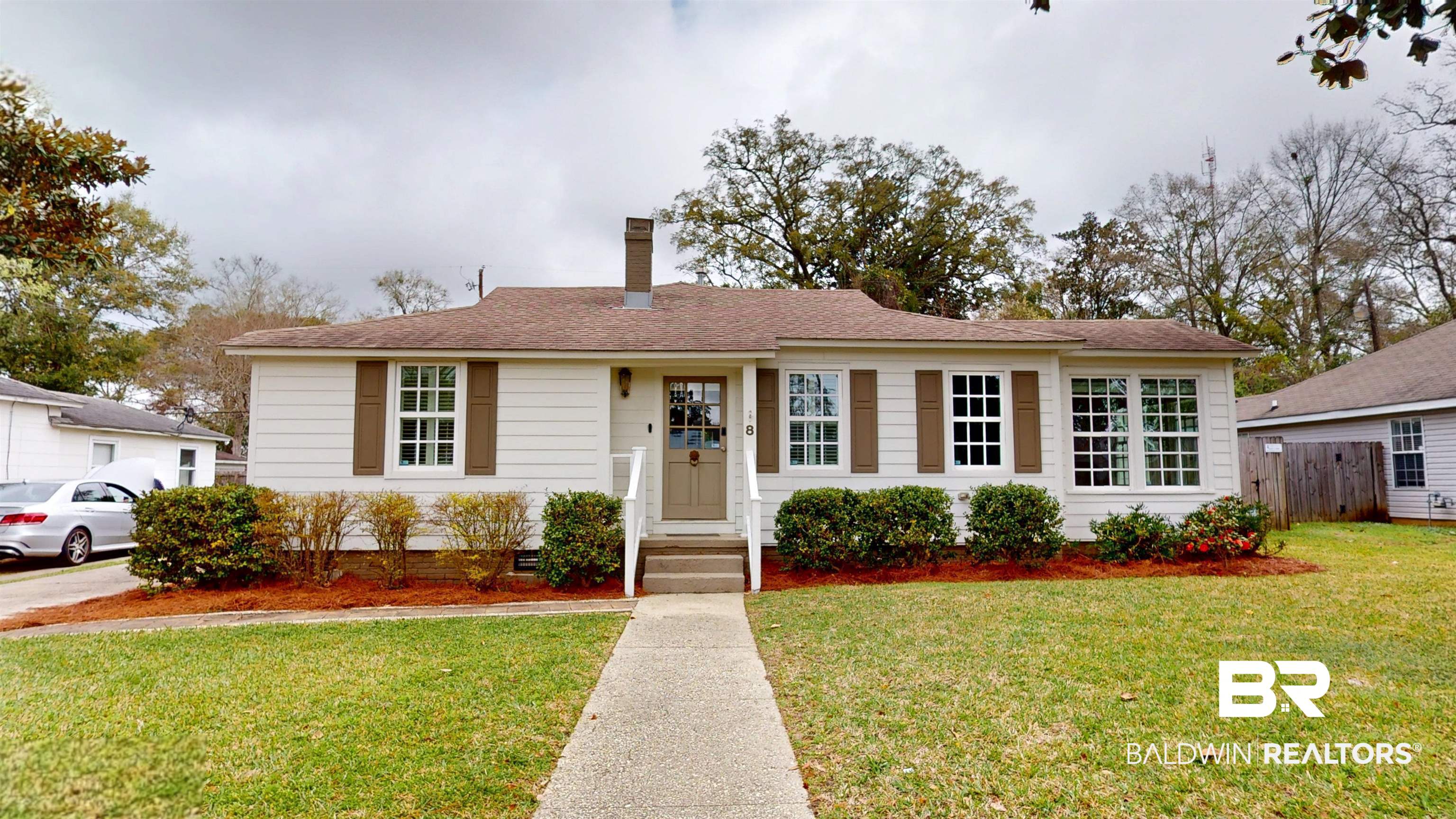 8 Lancaster Road Mobile, AL 36608 - Photo 1 of 24 Ranch-style house featuring a chimney and a shingled roof