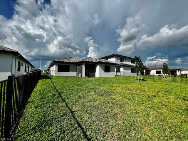 a front view of house with yard