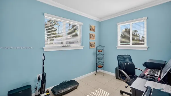 a bathroom with a sink and a window