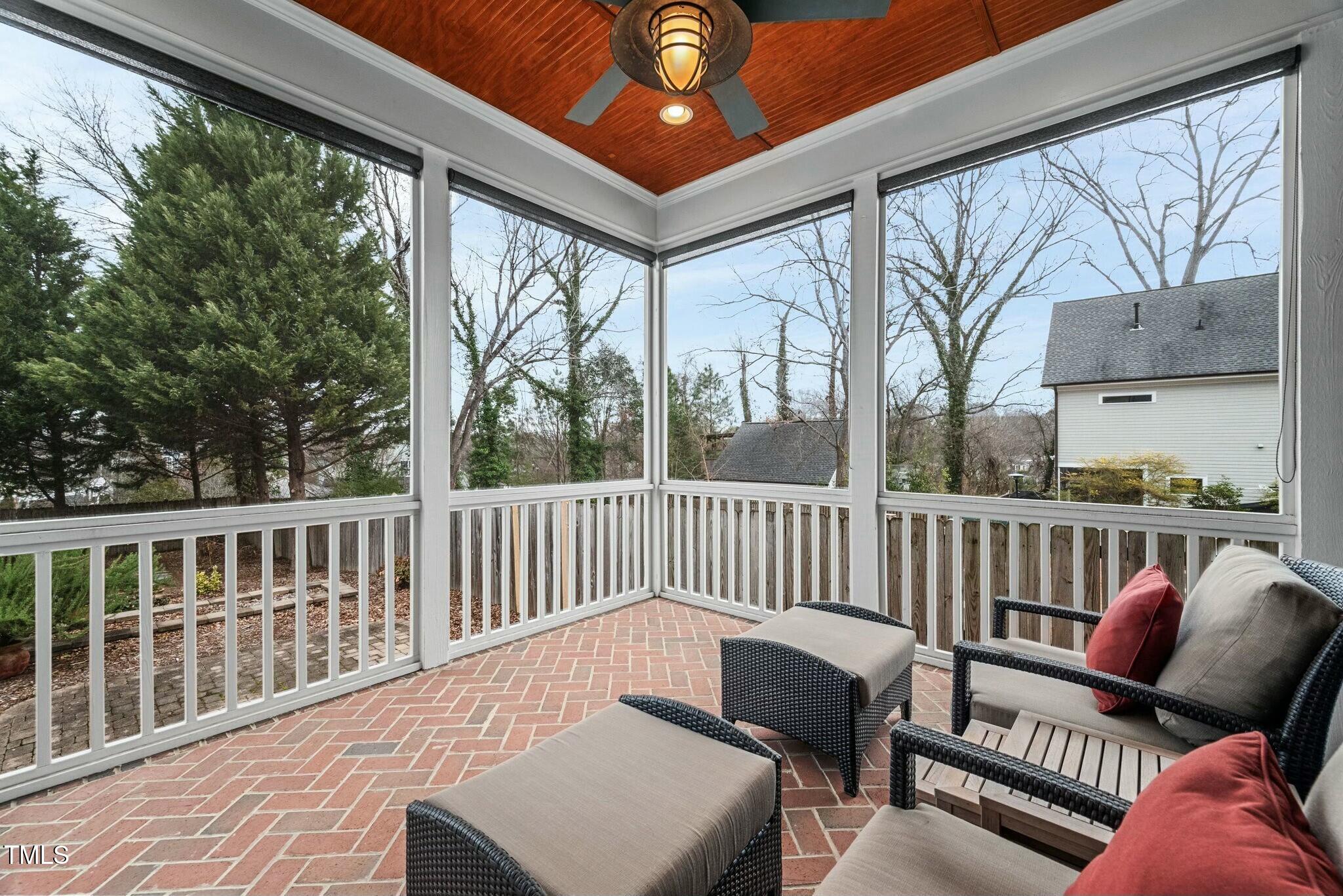 519 Peebles Street Raleigh, NC 27608 - Photo 35 of 43 a view of a chair in the deck
