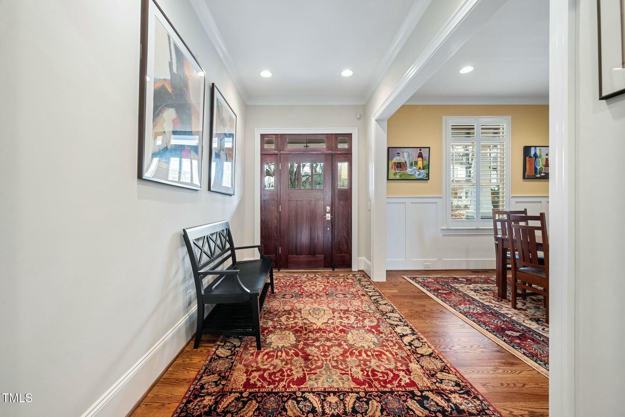 519 Peebles Street Raleigh, NC 27608 - Photo 9 of 43 a bedroom with a bed and a window