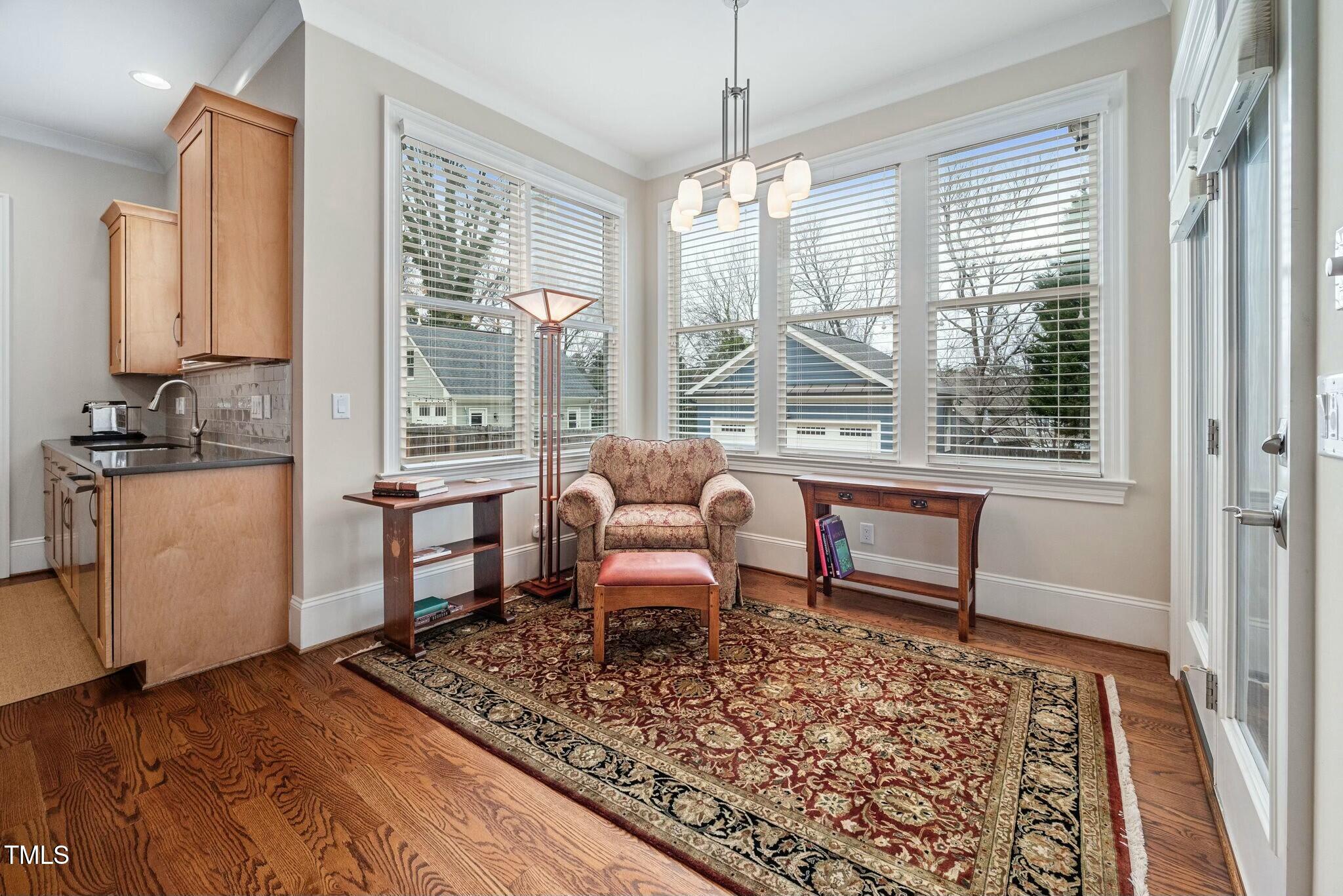 519 Peebles Street Raleigh, NC 27608 - Photo 10 of 43 a living room with furniture and a window