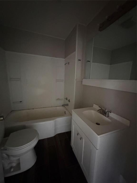 2240 Pin Oak Circle Haughton, LA 71037 - Photo 5 of 9 Bathroom with vanity, bathing tub / shower combination, and dark wood-style flooring