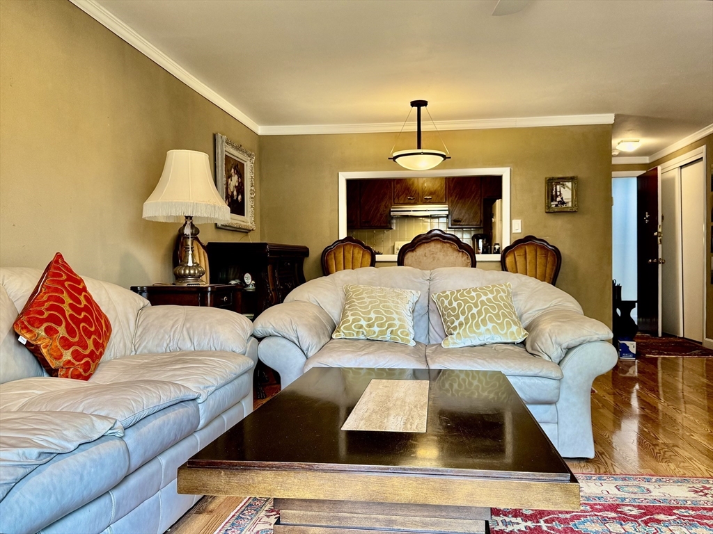 121 Tremont Street, Unit B1 Boston, MA 02135 - Photo 7 of 20 a bedroom with a bed and window