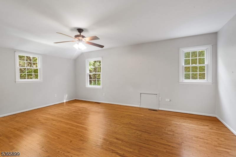 67 Frog Hollow Road Califon, NJ 07830 - Photo 19 of 31 a view of an empty room with a window