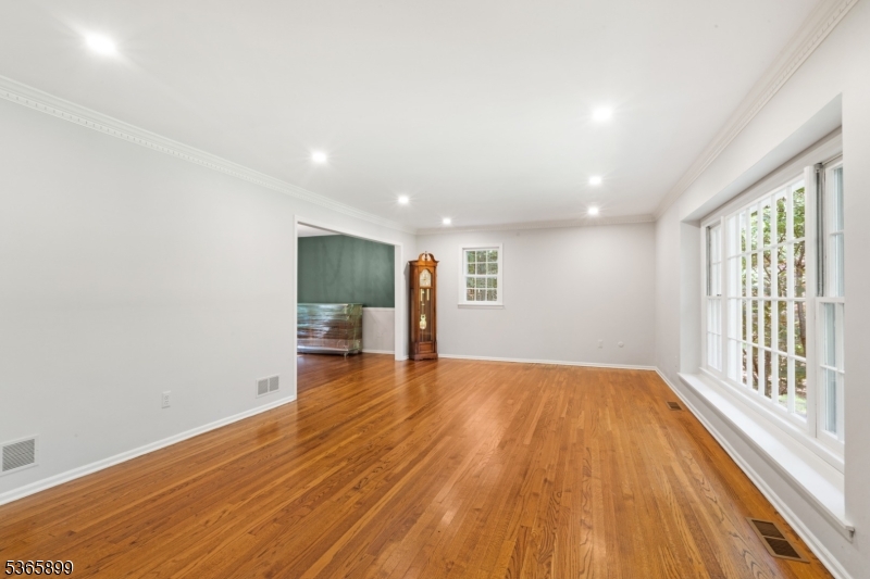 67 Frog Hollow Road Califon, NJ 07830 - Photo 2 of 31 wooden floor in an empty room with a window