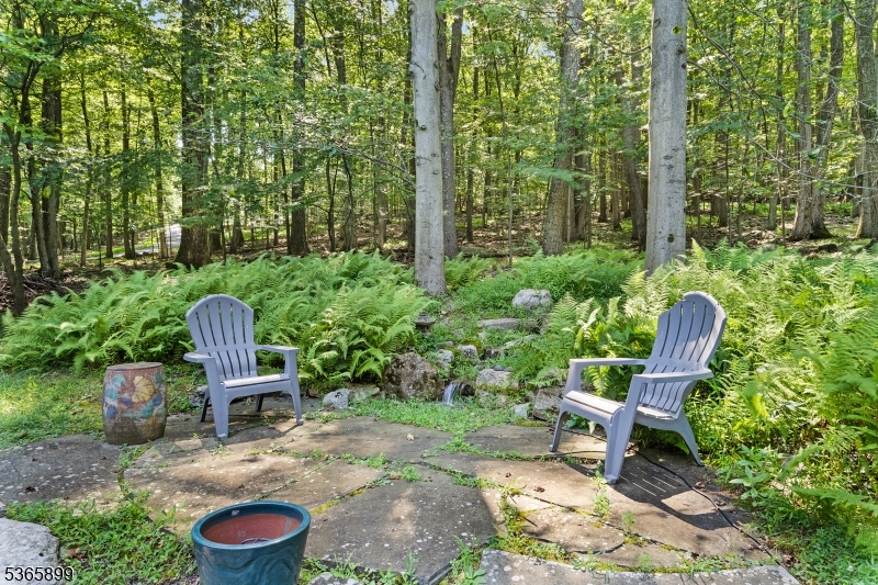 67 Frog Hollow Road Califon, NJ 07830 - Photo 29 of 31 a view of a chair and tables in the garden