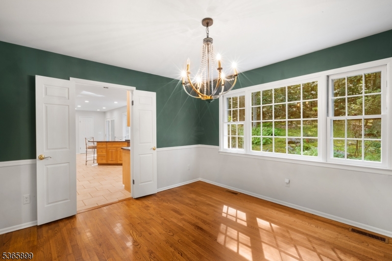 67 Frog Hollow Road Califon, NJ 07830 - Photo 6 of 31 a view of a room with window and wooden floor
