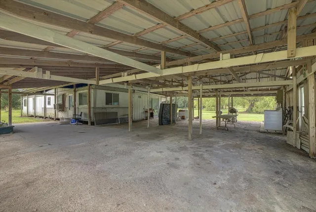 a view of a room with wooden walls